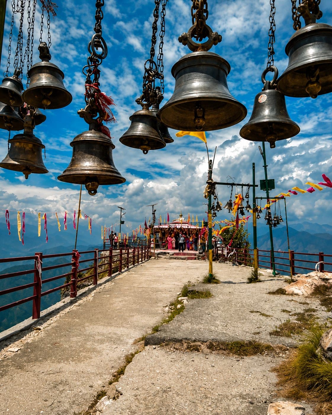 Rows of bells at the mountaintop Kartik Swami Temple