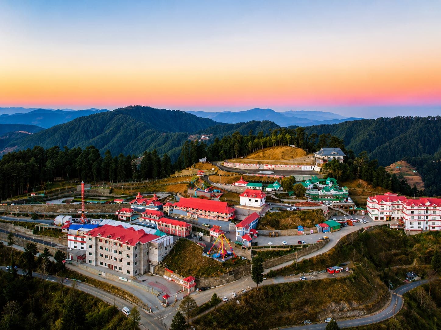 Aerial view of a Himachal hill town at dusk